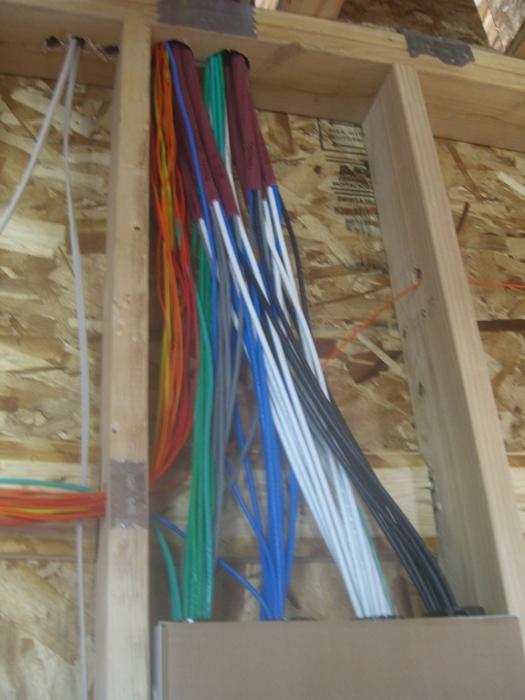 Installation of electricians in a wooden house