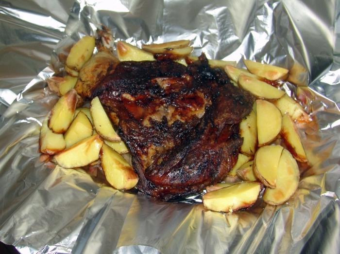 We prepare a festive dish - meat in foil in the oven with potatoes and cheese