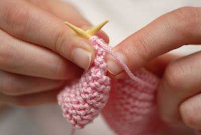 Help in the designation of knitting with knitting needles