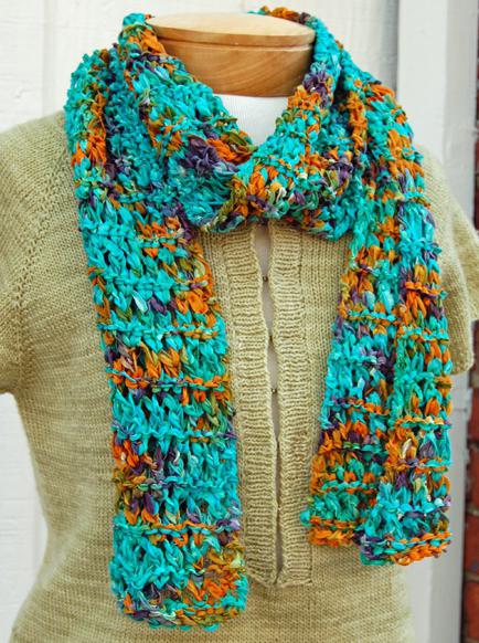 knit an openwork scarf with knitting needles